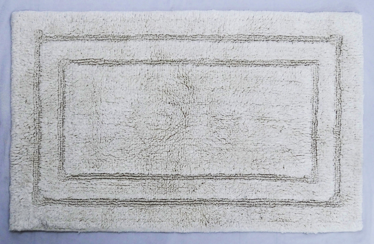 Ivory Cotton Bath Rug — 20 × 32 in
