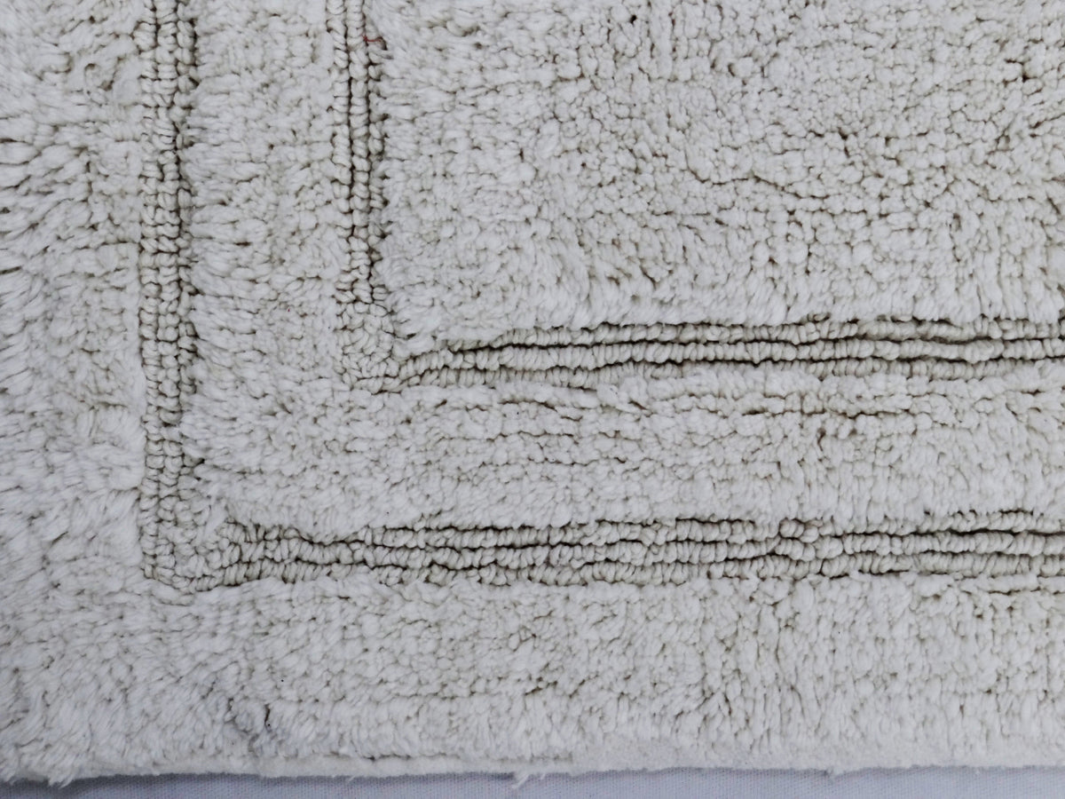 Ivory Cotton Bath Rug — 20 × 32 in